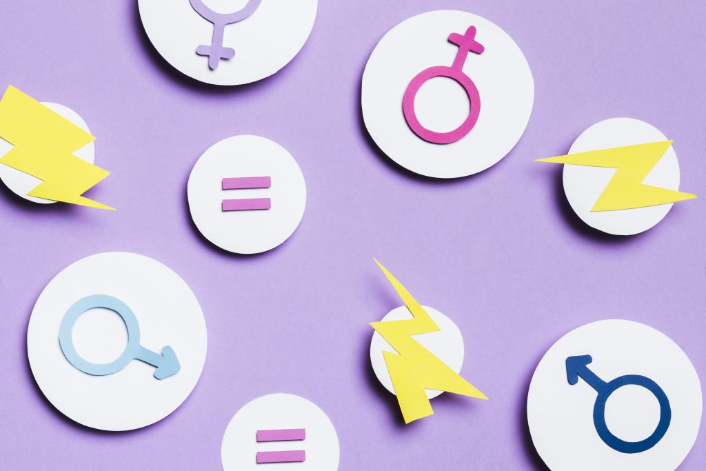 Imagen de símbolos de mujer y hombre representativos de la diversidad de género y la sexualidad humana.